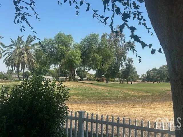 a view of a yard with a house