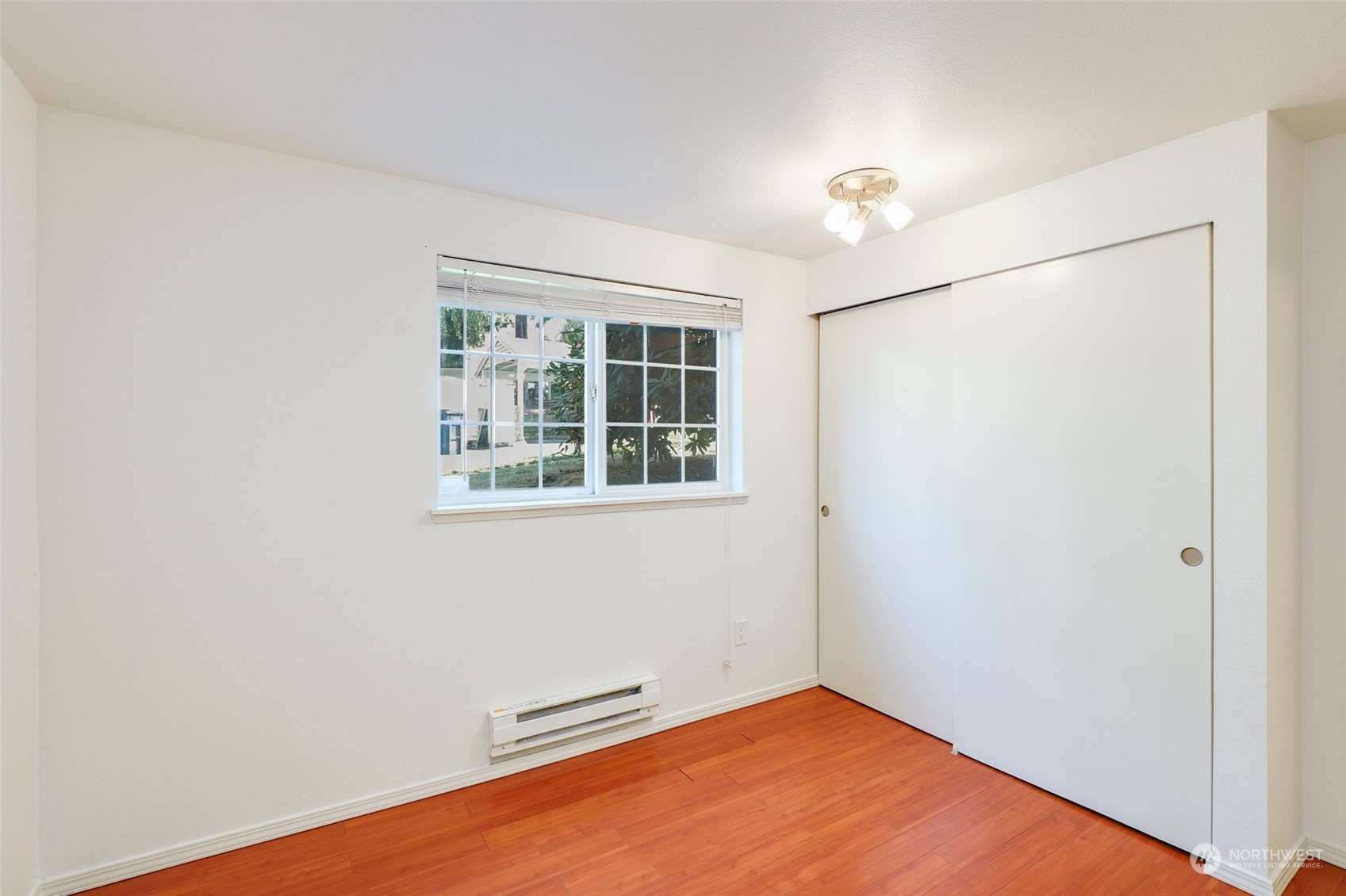 901 Sunset Boulevard Northeast, Unit D115 Renton, WA 98056 - Photo 15 of 19 a view of an empty room with a window