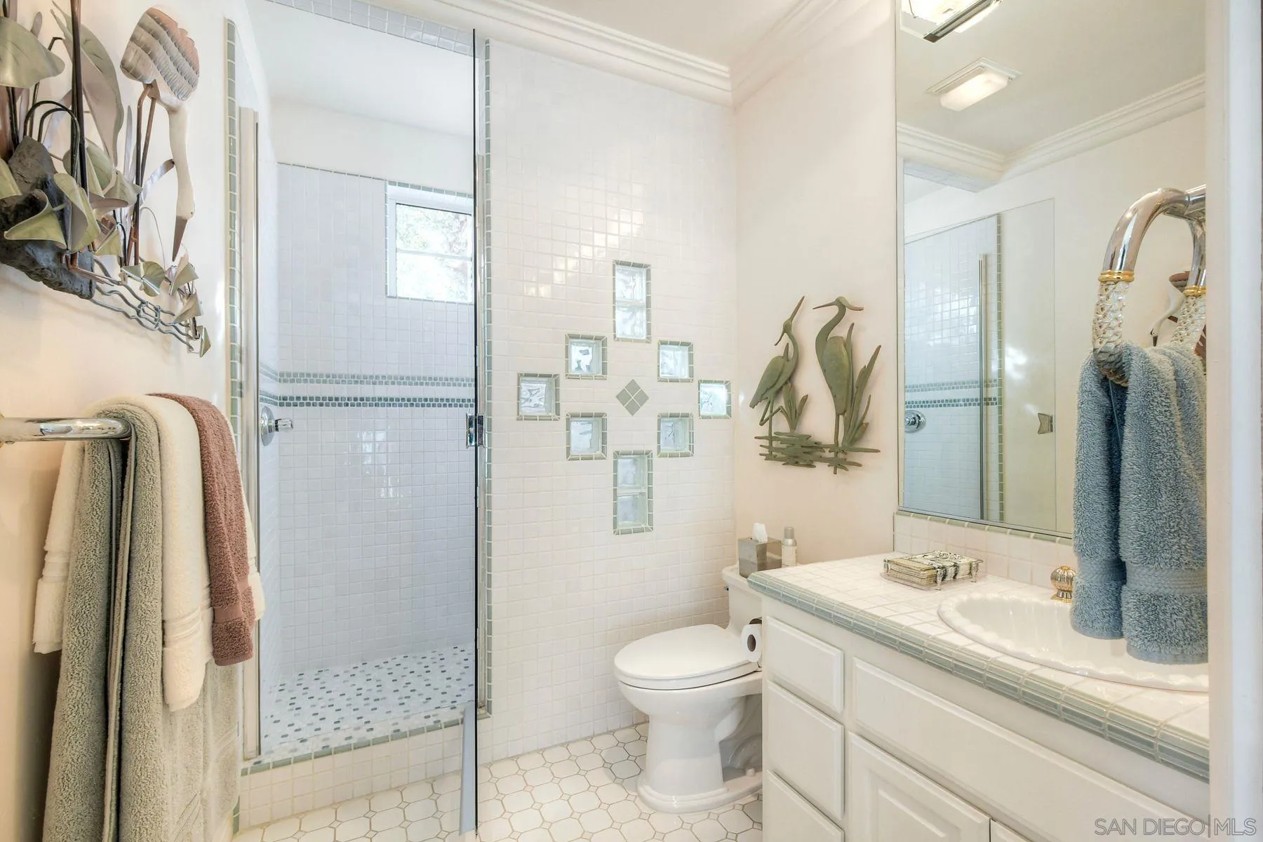 13455 Old Winery Road Poway, CA 92064 - Photo 21 of 46 a bathroom with a granite countertop sink a toilet and shower