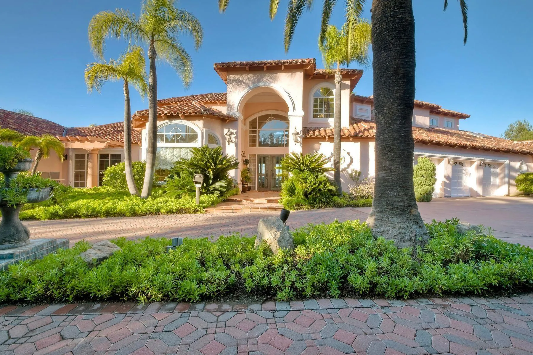 13455 Old Winery Road Poway, CA 92064 - Photo 3 of 46 a front view of a house with garden