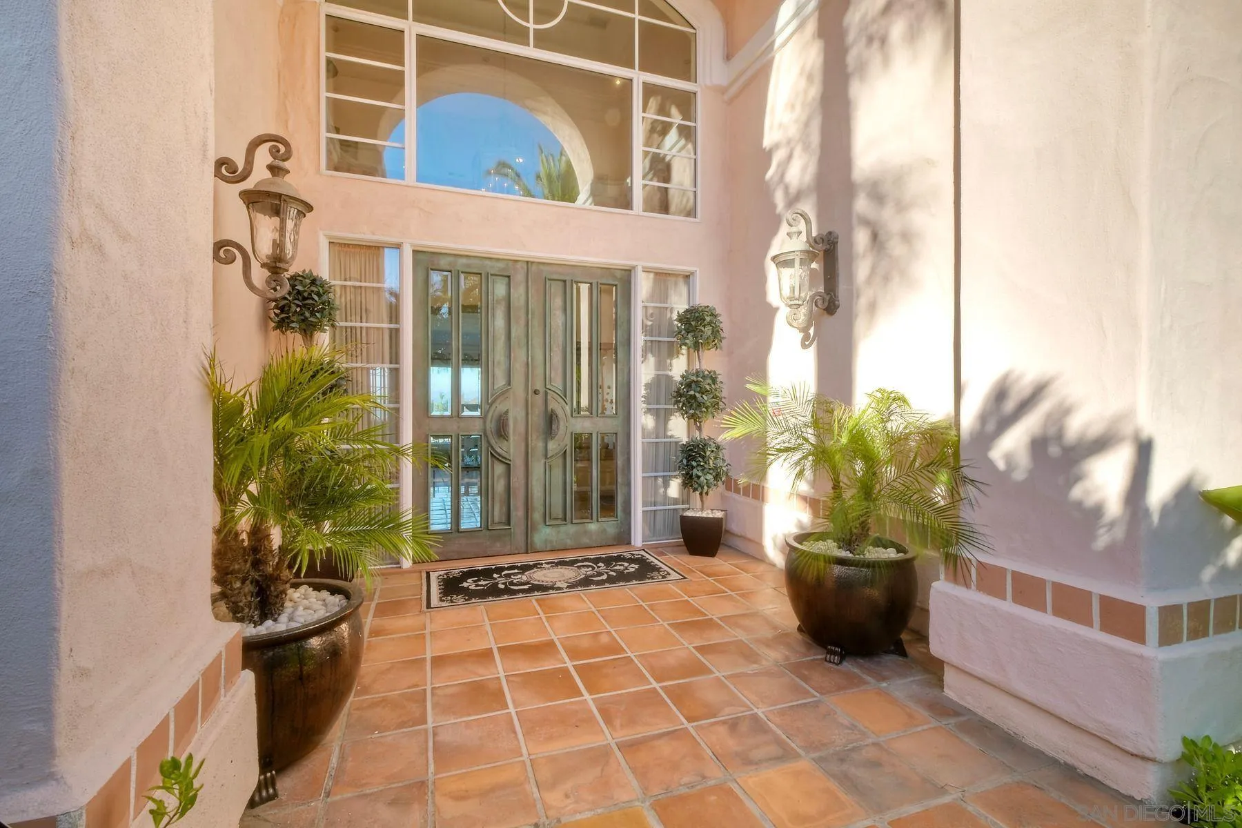 13455 Old Winery Road Poway, CA 92064 - Photo 3 of 46 a view of a house with a potted plant