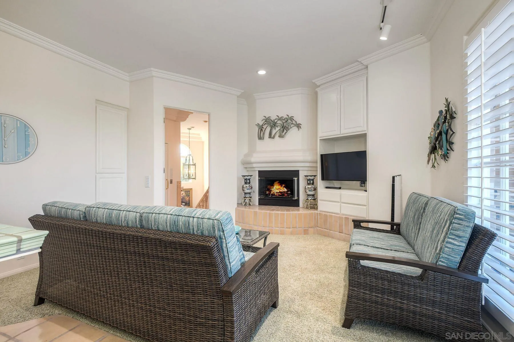 13455 Old Winery Road Poway, CA 92064 - Photo 33 of 46 a living room with furniture and a fireplace