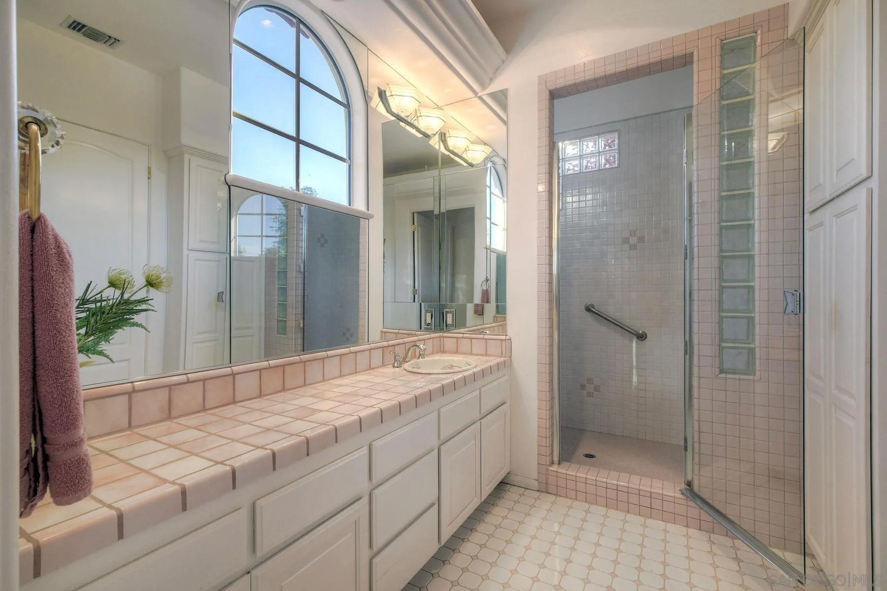 13455 Old Winery Road Poway, CA 92064 - Photo 34 of 46 a bathroom with a granite countertop sink and shower