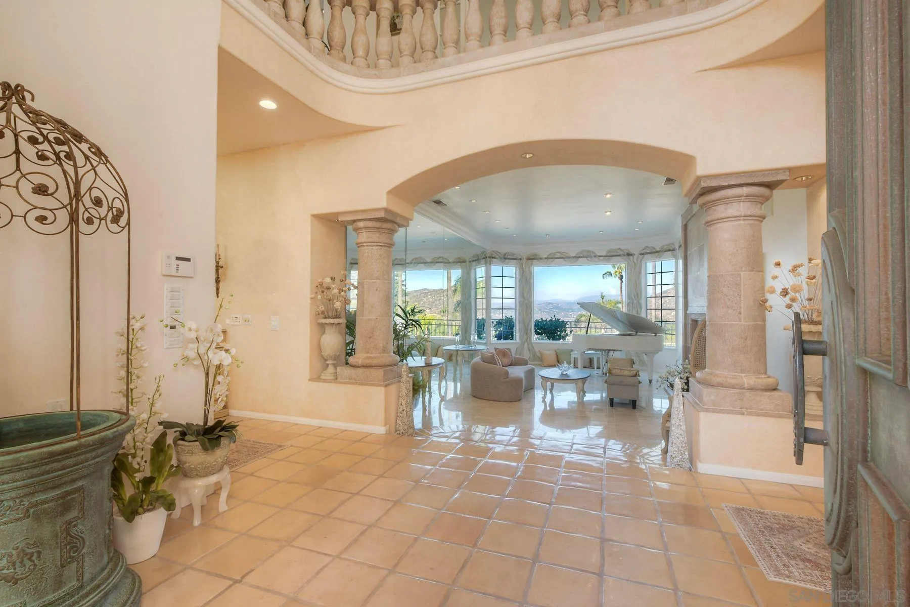 13455 Old Winery Road Poway, CA 92064 - Photo 5 of 46 a lobby with furniture and floor to ceiling window