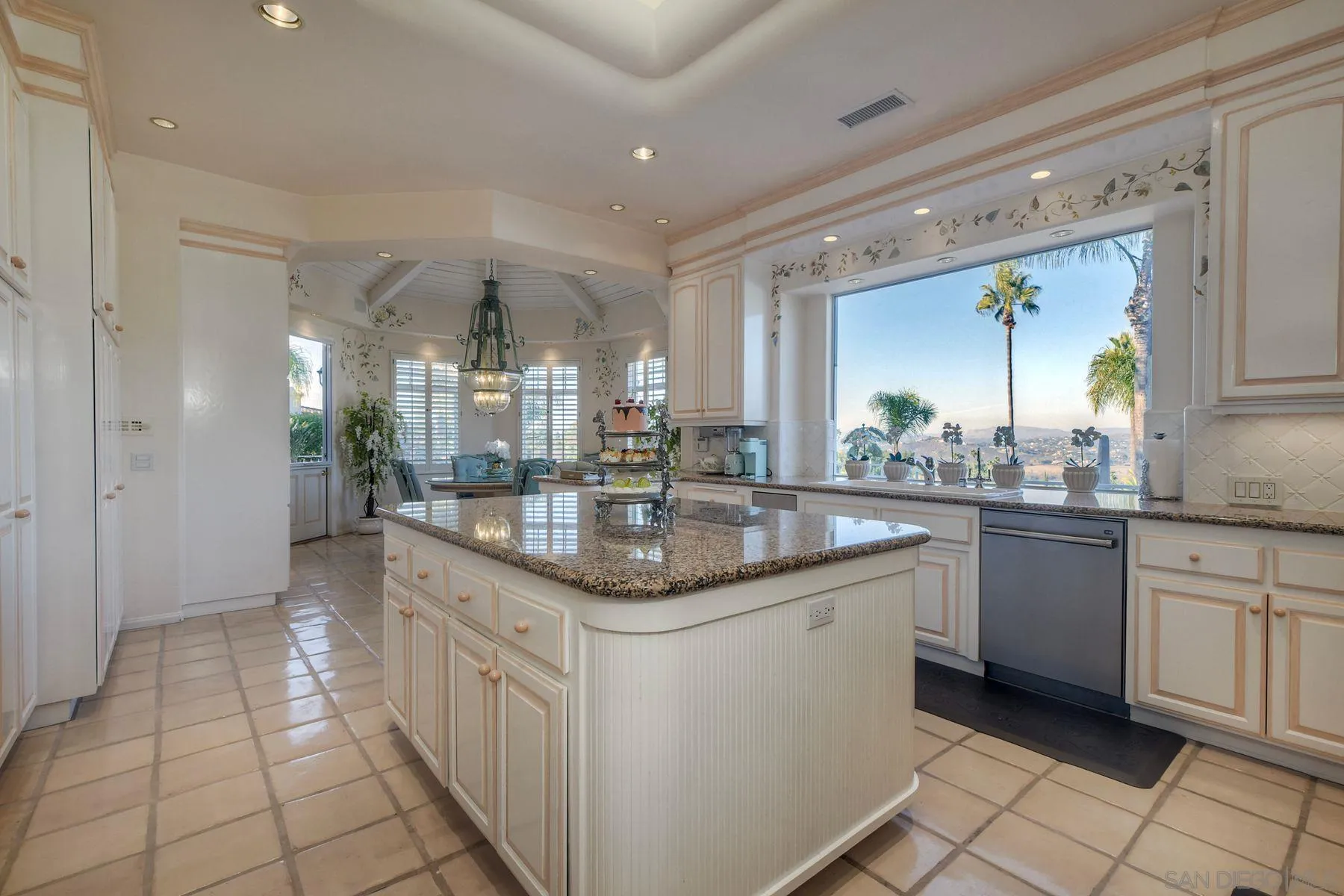 13455 Old Winery Road Poway, CA 92064 - Photo 8 of 46 a kitchen with granite countertop a sink and cabinets