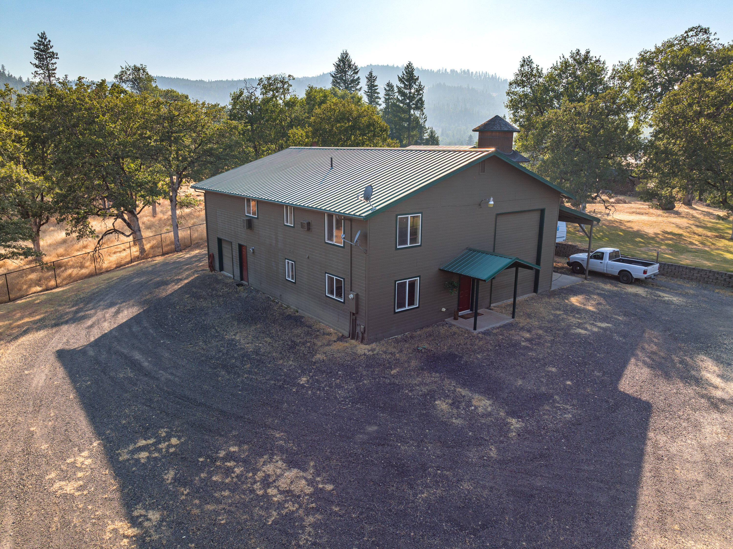 536 Ragsdale Road Trail, OR 97541 - Photo 5 of 67 a view of a house with a yard and large tree