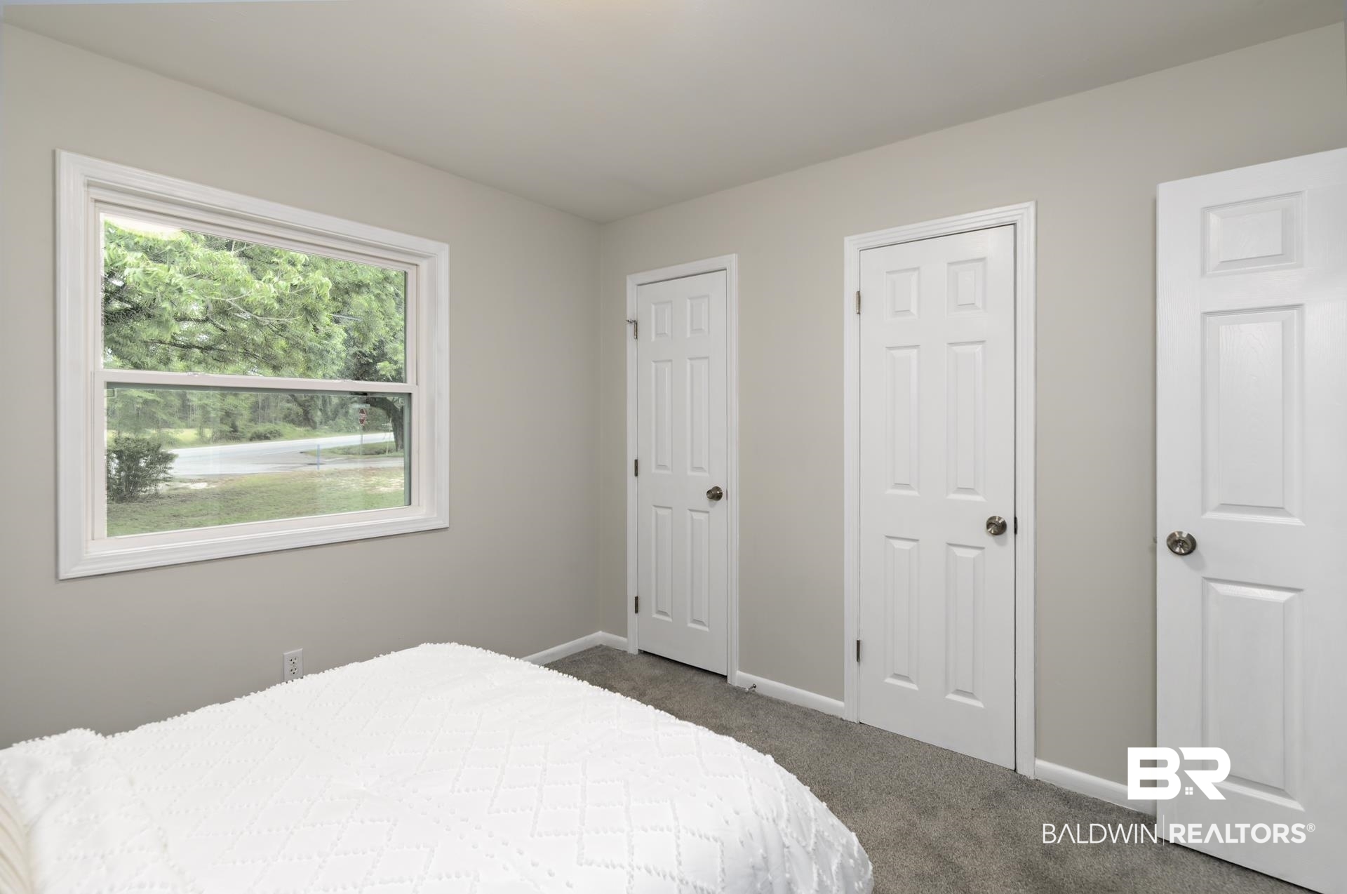 5922 Sunnyside Drive Mobile, AL 36619 - Photo 29 of 51 Bedroom with dark colored carpet and baseboards