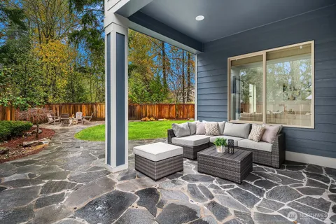 a view of a patio with garden
