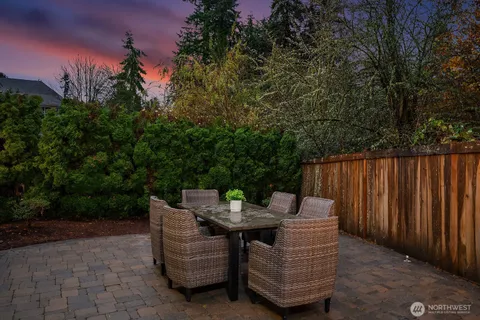 a view of outdoor dining space with furniture
