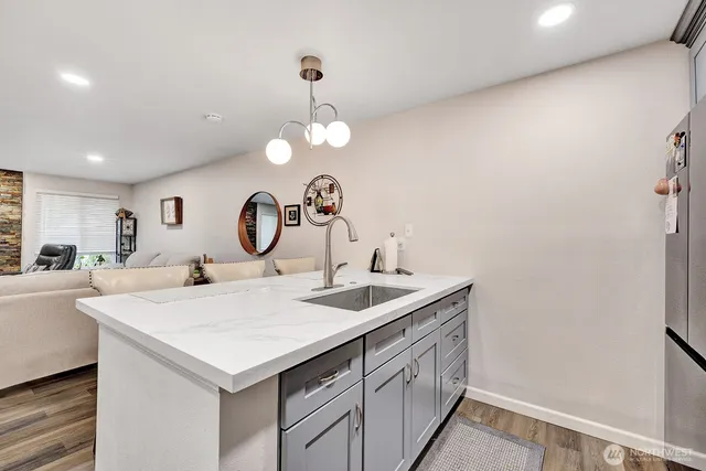 a very nice looking dining room with a table and chairs