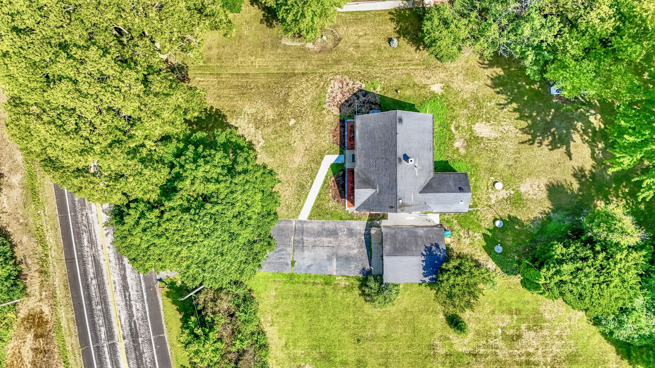 550 North Riverside Drive Saukville, WI 53080 - Photo 29 of 35 Open space, nestled in mature trees