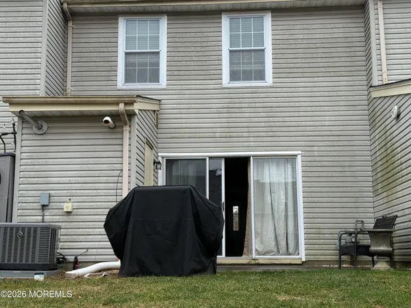 a view of a back yard of the house