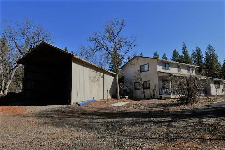 640-775 Iris Road McArthur, CA 96056 - Photo 2 of 8 a front view of a house with a yard