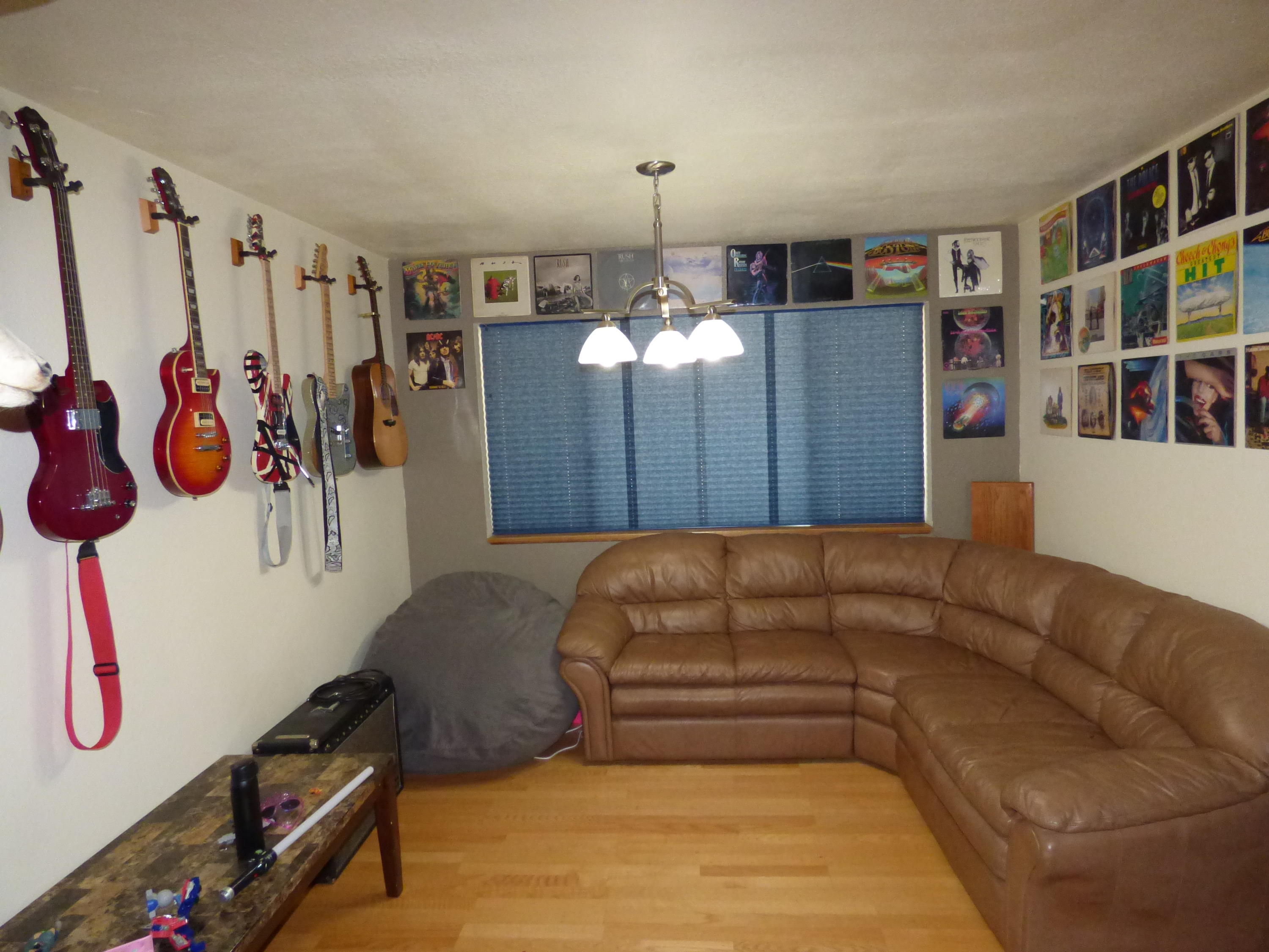 640-775 Iris Road McArthur, CA 96056 - Photo 3 of 8 a living room with furniture a rug and a chandelier