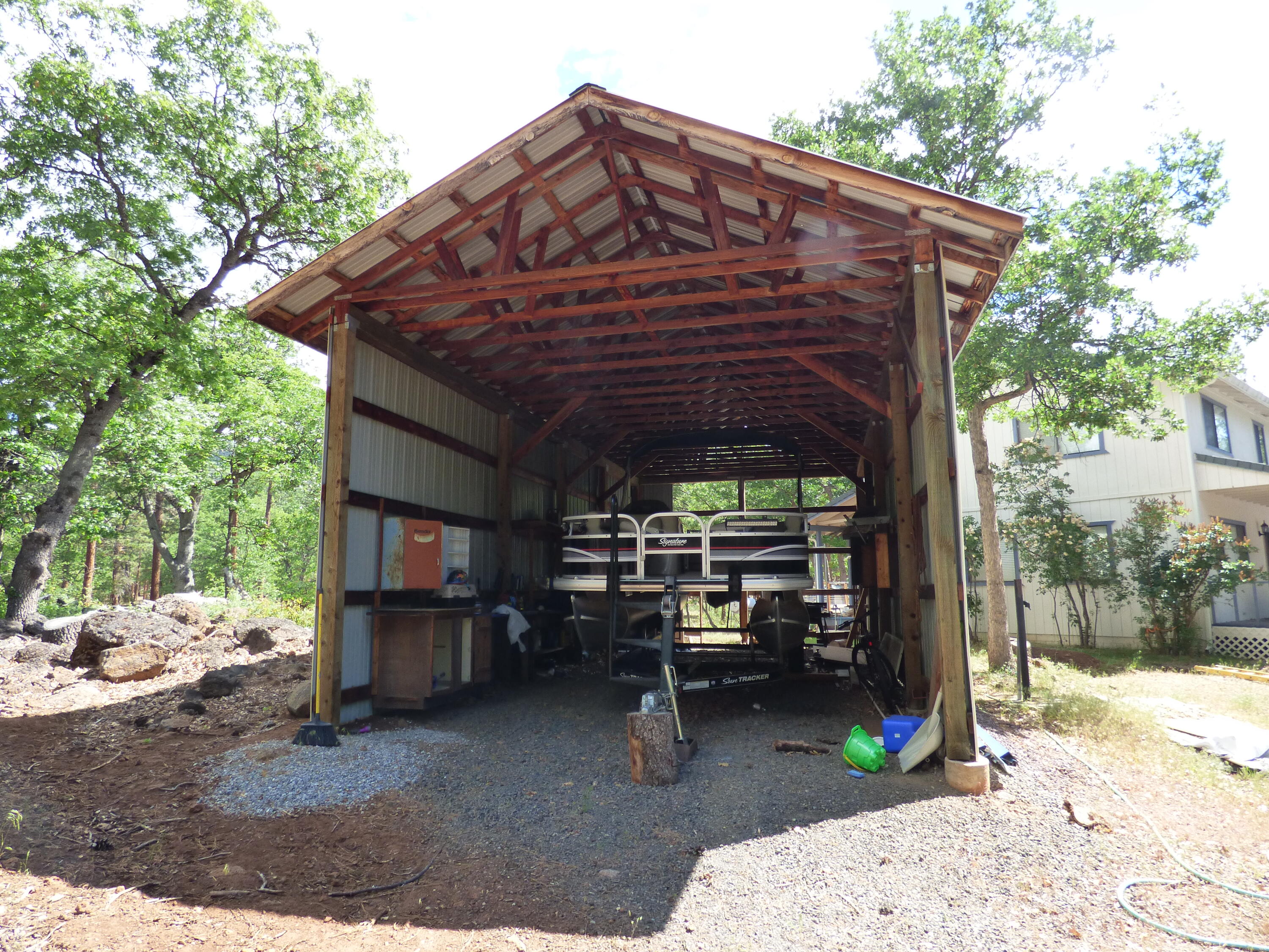 640-775 Iris Road McArthur, CA 96056 - Photo 5 of 8 a view of patio with a table and chairs under an umbrella