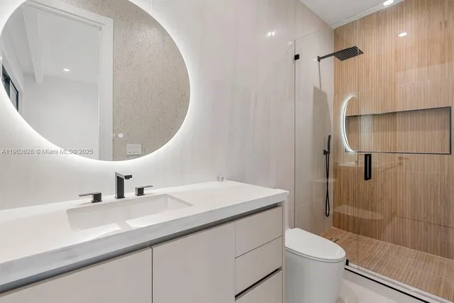 a kitchen with counter top space and stainless steel appliances