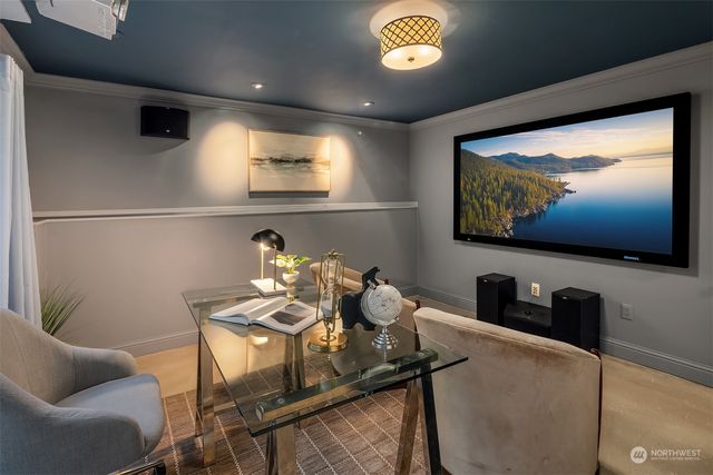 a livingroom with furniture and a flat screen tv