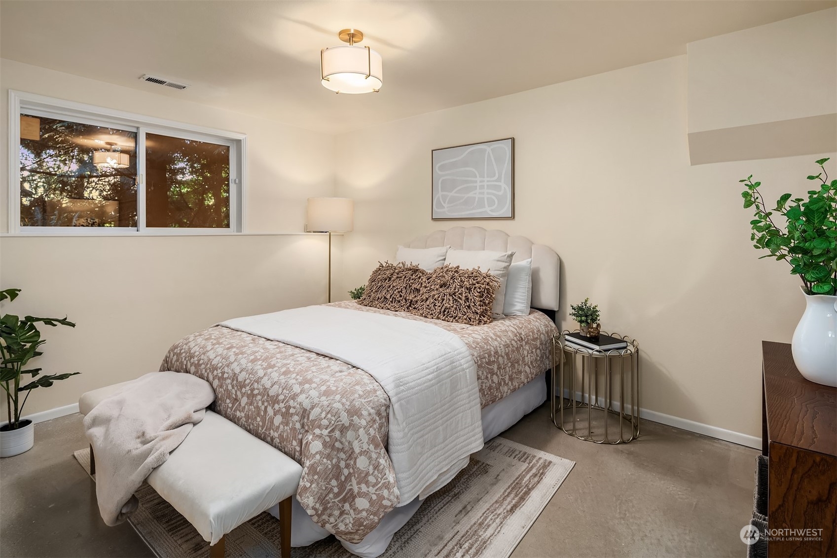 730 Redmond-Fall City Road Northeast Carnation, WA 98014 - Photo 23 of 40 a bedroom with a bed and a chair