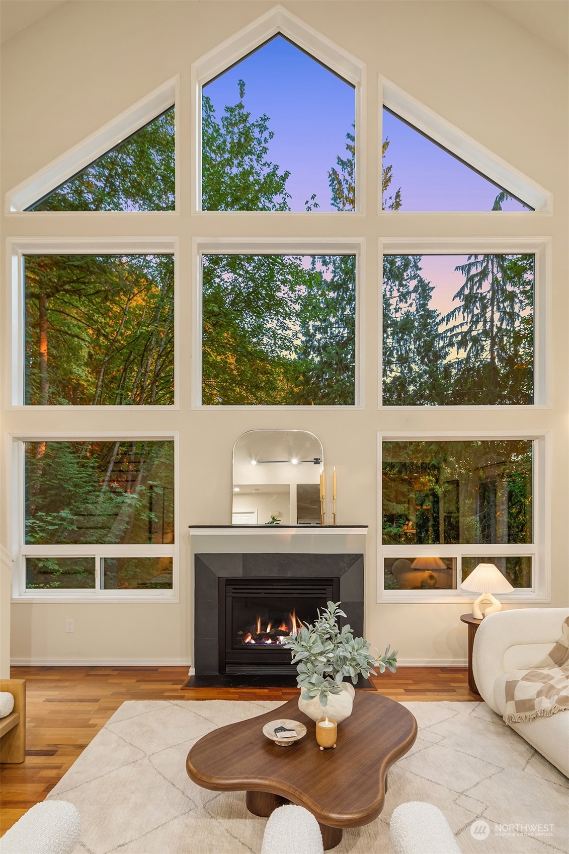 730 Redmond-Fall City Road Northeast Carnation, WA 98014 - Photo 31 of 40 a living room with furniture and a large window