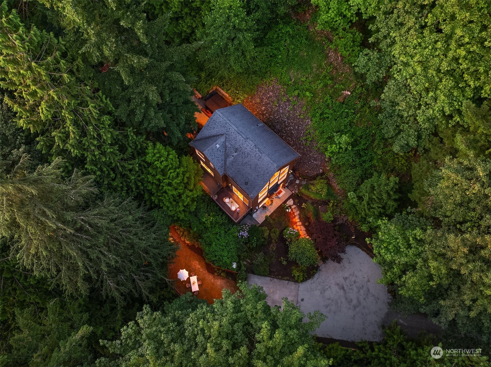 730 Redmond-Fall City Road Northeast Carnation, WA 98014 - Photo 8 of 40 an aerial view of a house with a yard and large trees