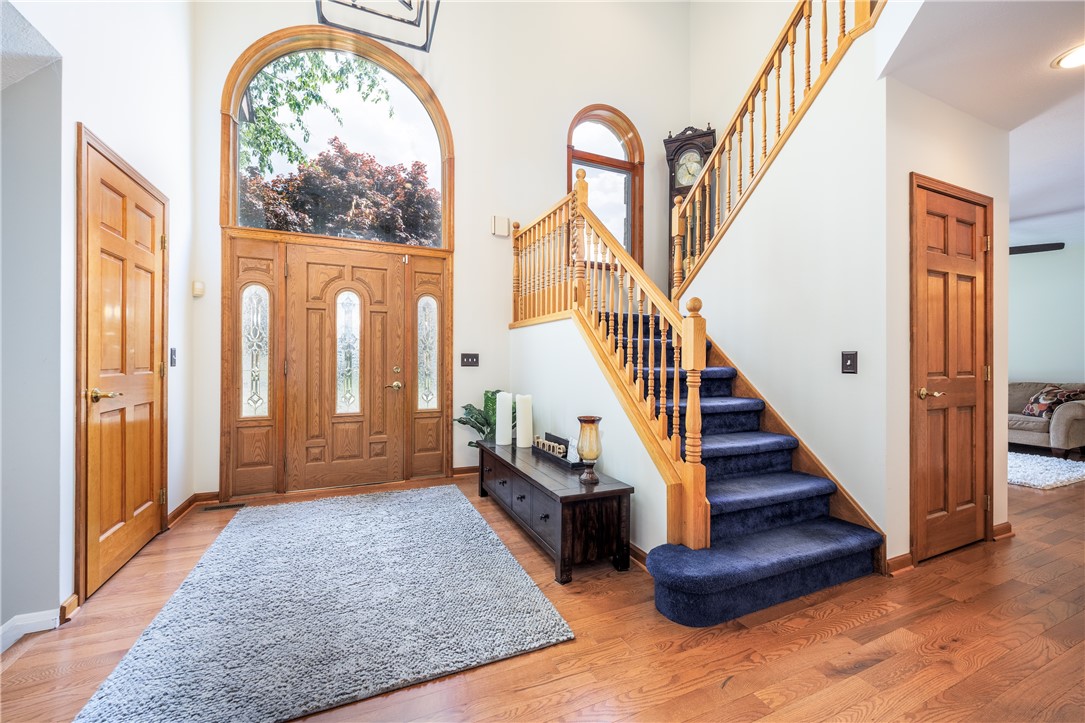 210 Buck Hill Road Greece, NY 14626 - Photo 6 of 49 AMAZING TWO STORY FOYER WITH ARCH WINDOWS WITH BEA