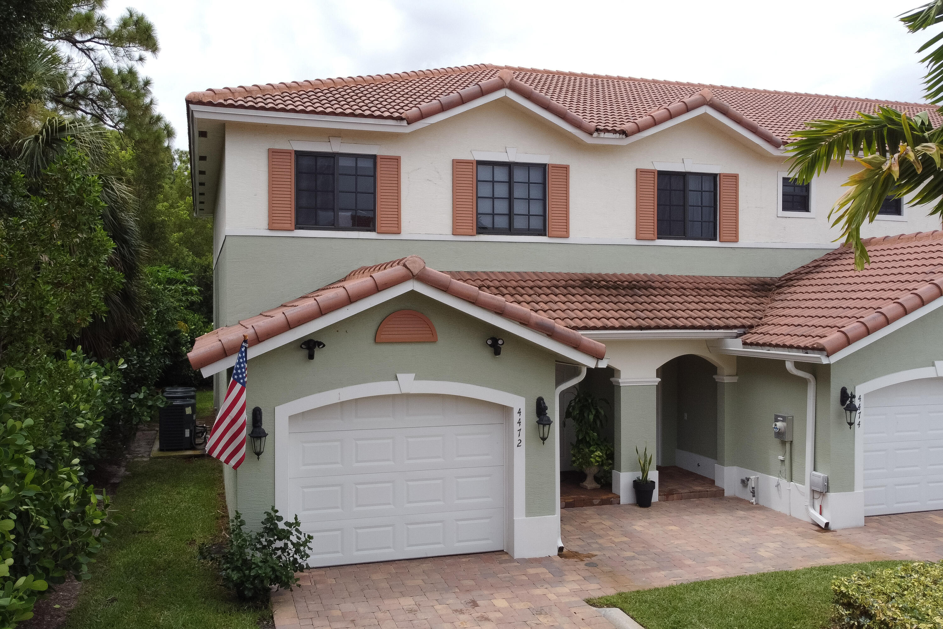 4472 Leo Lane Palm Beach Gardens, FL 33410 - Photo 1 of 35 Front
