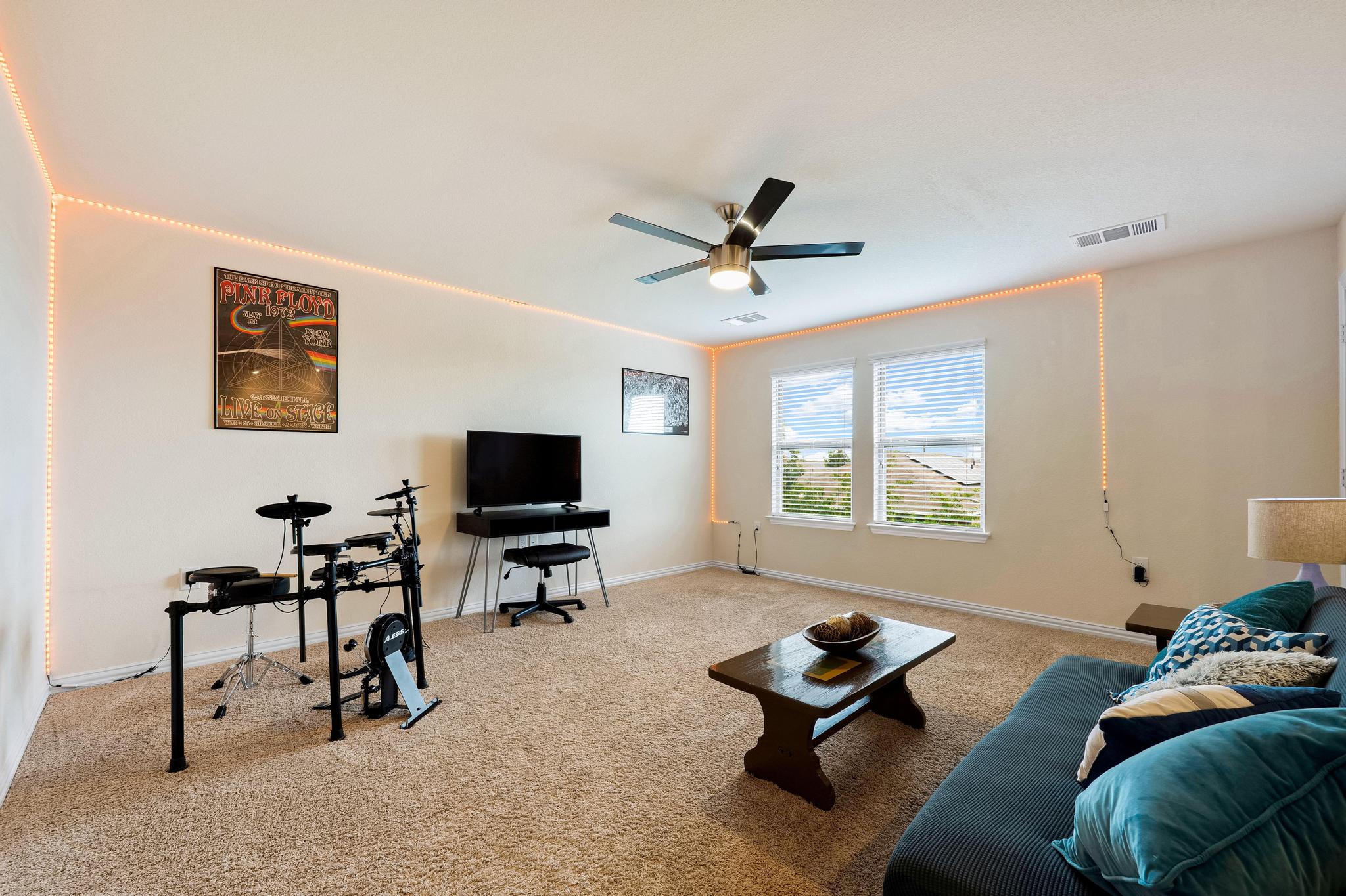 6905 Vail Ridge Street Austin, TX 78744 - Photo 22 of 39 Upstairs loft with flex space / media room