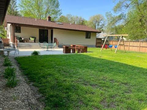 545 West Hill Road Morris, IL 60450 - Photo 17 of 17 a view of a house with a backyard and a patio