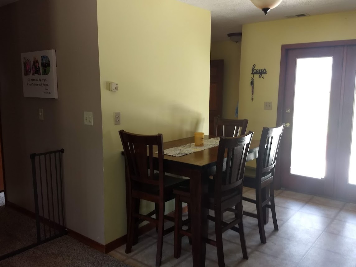 545 West Hill Road Morris, IL 60450 - Photo 6 of 17 a view of a dining room with furniture and wooden floor