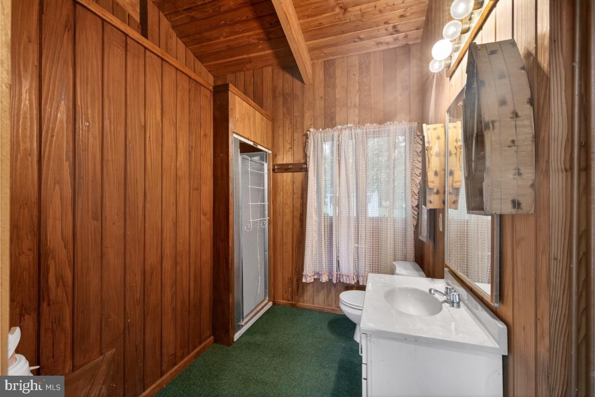 10320 Glen Road Potomac, MD 20854 - Photo 51 of 75 a bathroom with a sink and a mirror