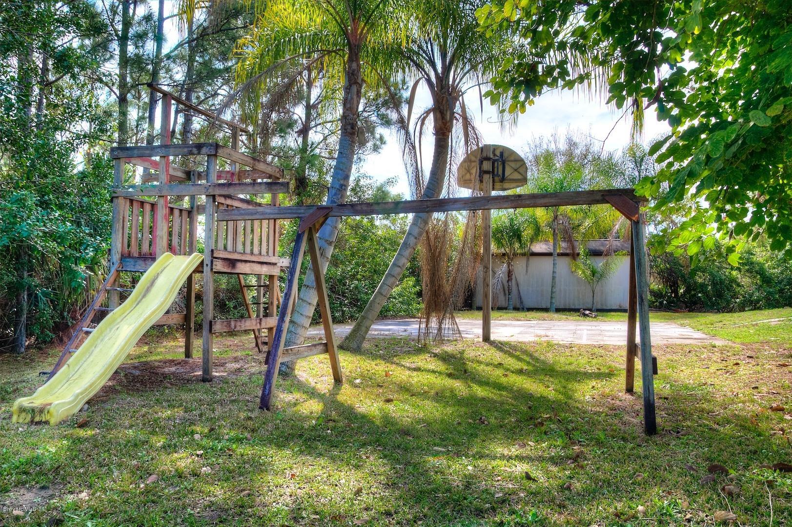 4615 Corey Road Malabar, FL 32950 - Photo 19 of 26 playground&bballcourt