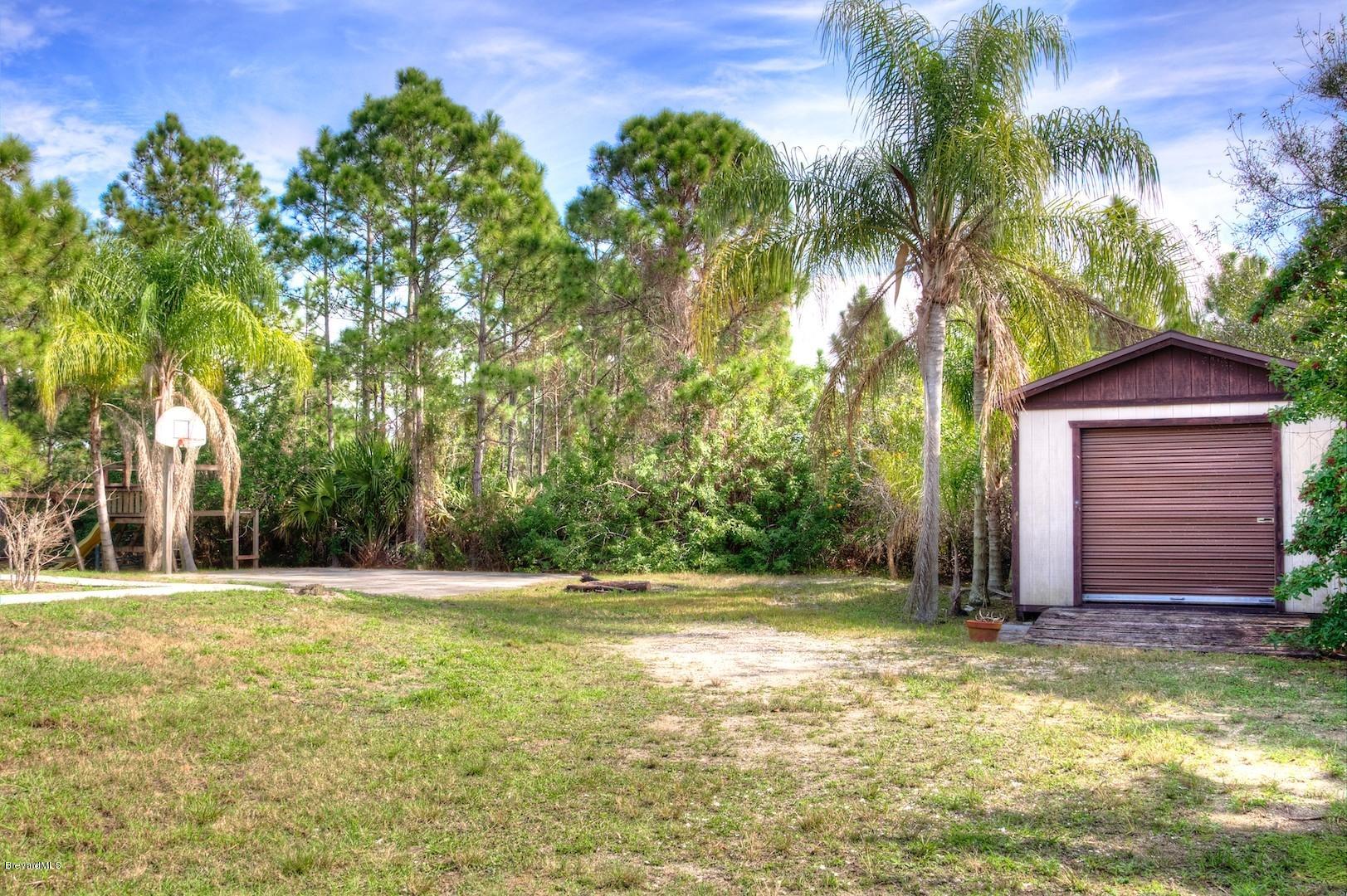 4615 Corey Road Malabar, FL 32950 - Photo 21 of 26 workshed&bballcourt