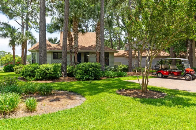 a house view with a garden space