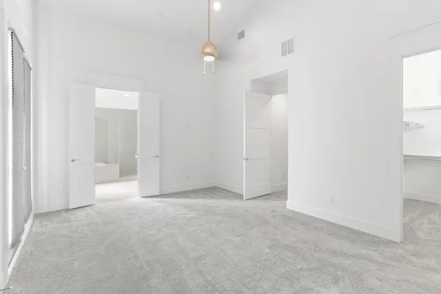 an empty room with a bathroom