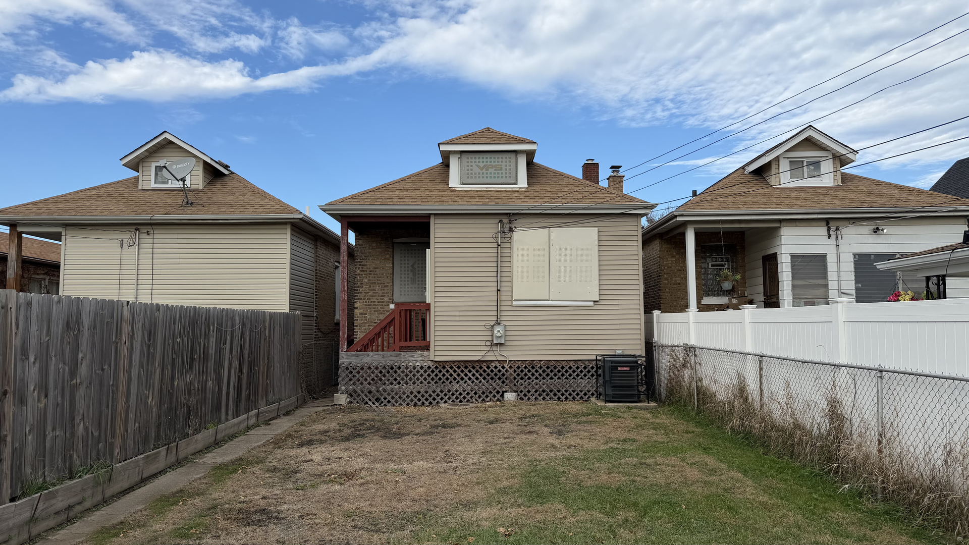 435 East 88th Place Chicago, IL 60619 - Photo 20 of 21 a front view of a house with garage