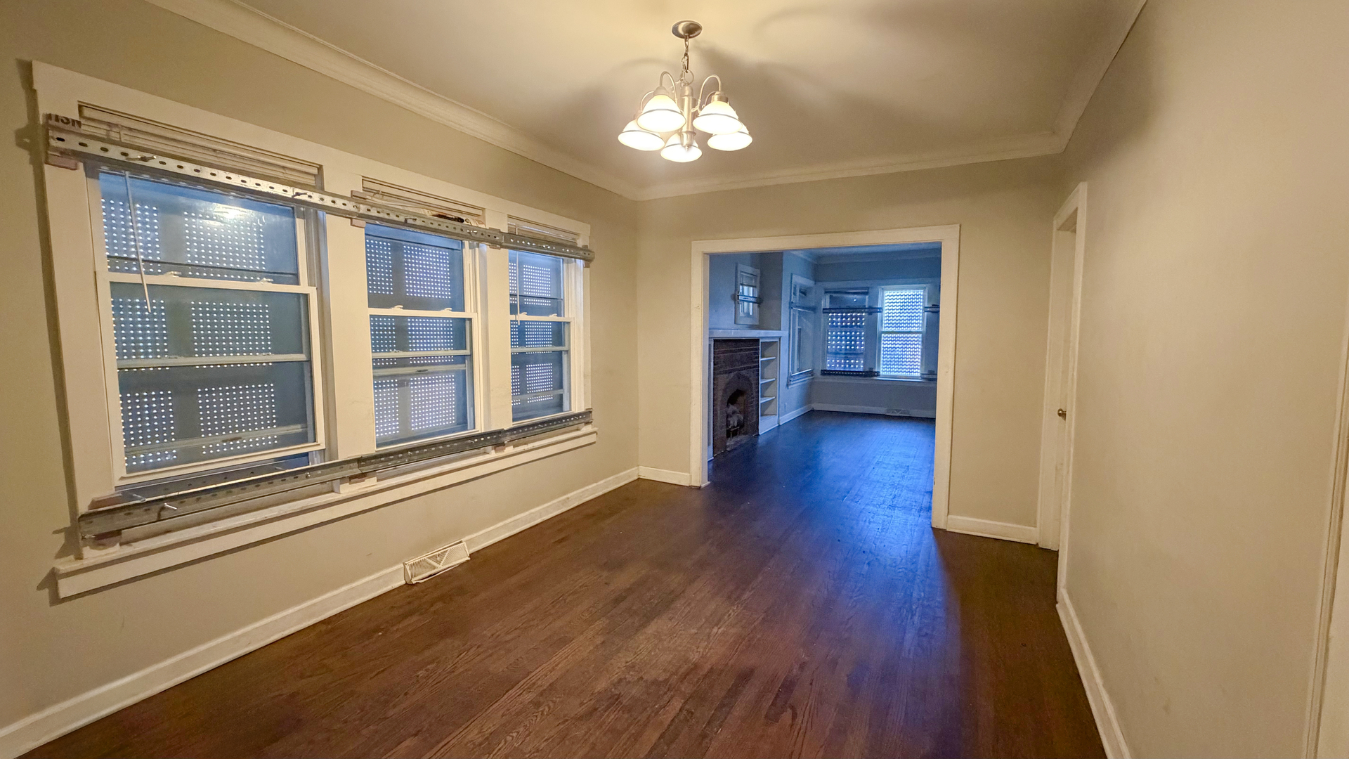 435 East 88th Place Chicago, IL 60619 - Photo 8 of 21 a view of a livingroom with wooden floor