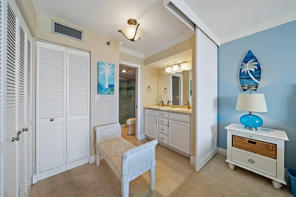 a bathroom with a sink a vanity and a mirror