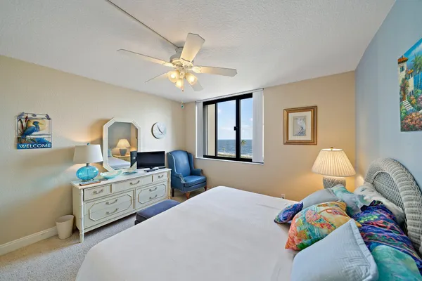 a room with furniture and a large window