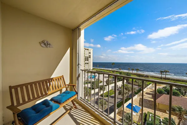 a view of ocean from a balcony
