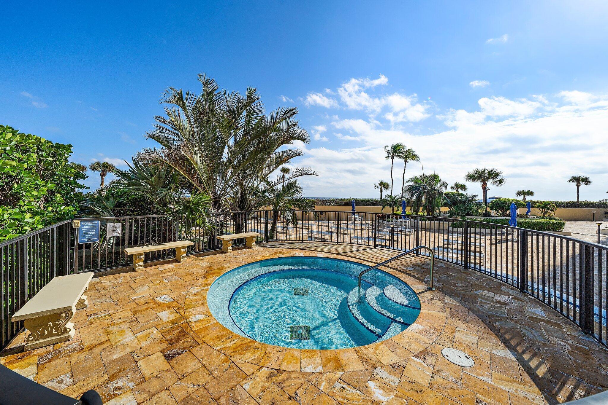 100 Ocean Trail Way, Unit 609 Jupiter, FL 33477 - Photo 40 of 66 a view of a swimming pool with a patio