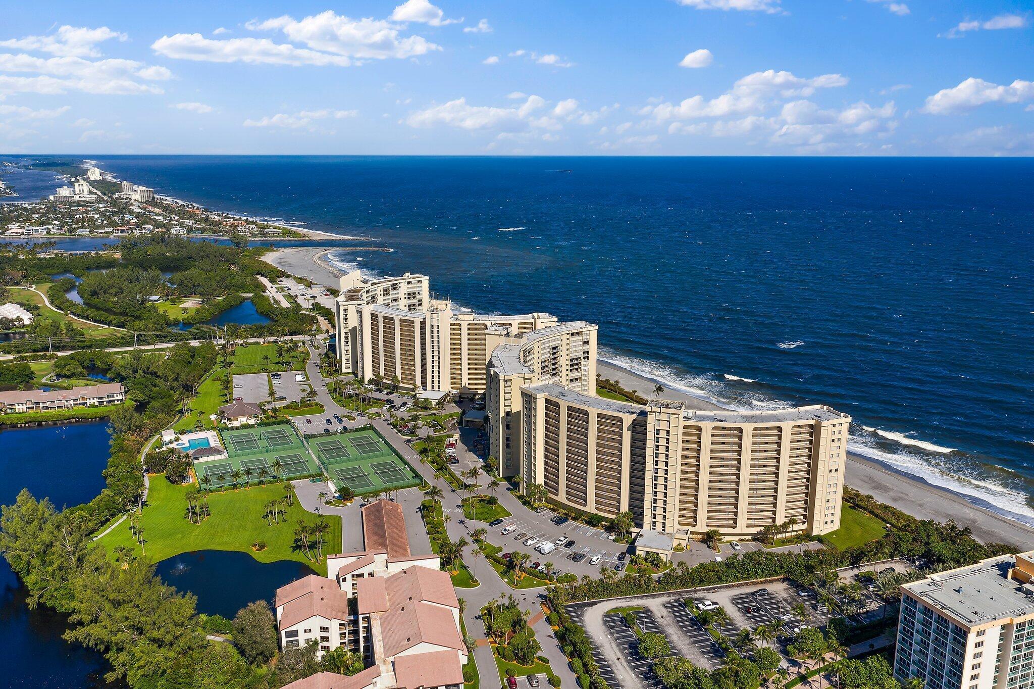100 Ocean Trail Way, Unit 609 Jupiter, FL 33477 - Photo 49 of 66 a view of building with yard