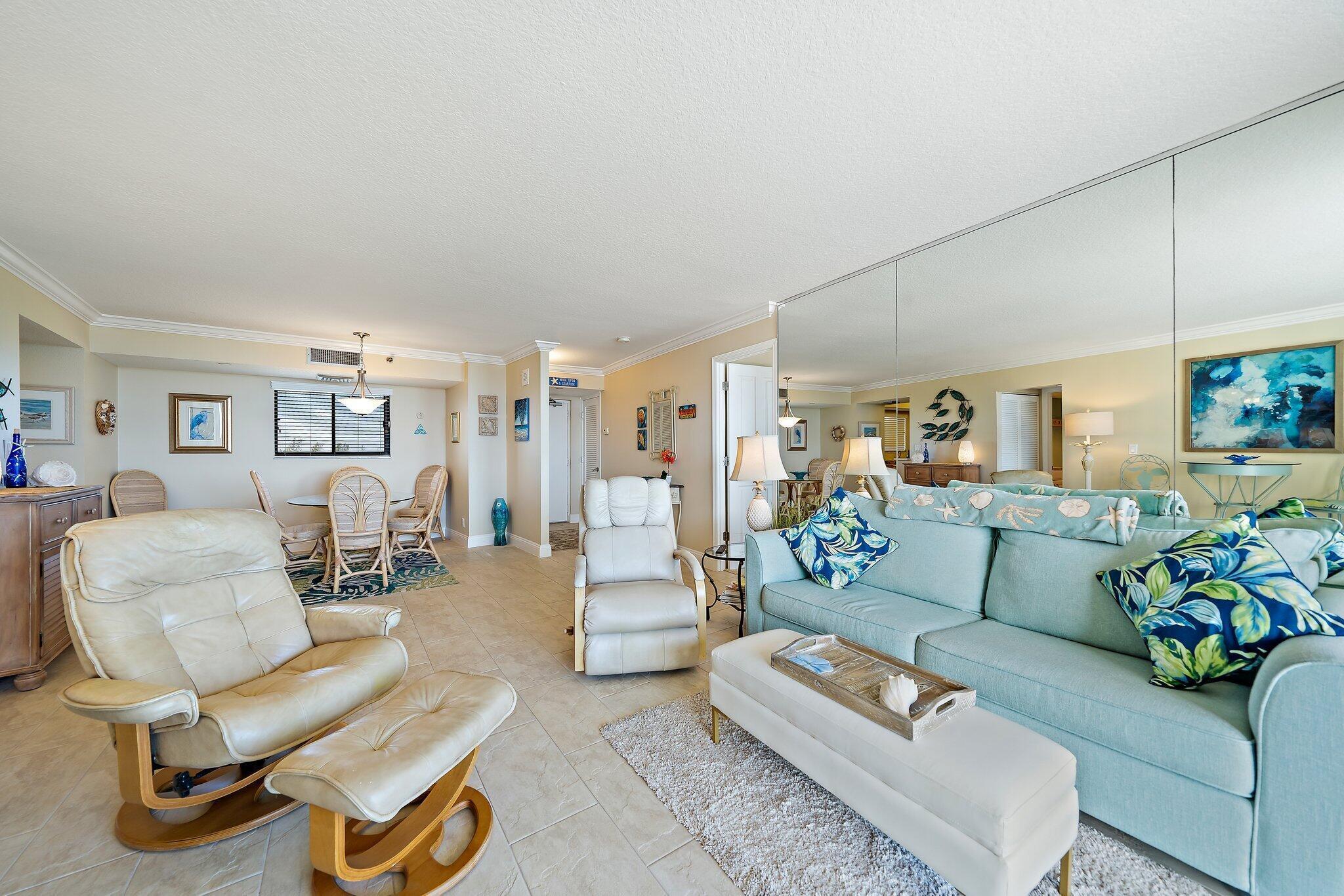 100 Ocean Trail Way, Unit 609 Jupiter, FL 33477 - Photo 10 of 66 a living room with furniture and wooden floor