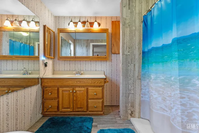 a bathroom with a sink and a mirror