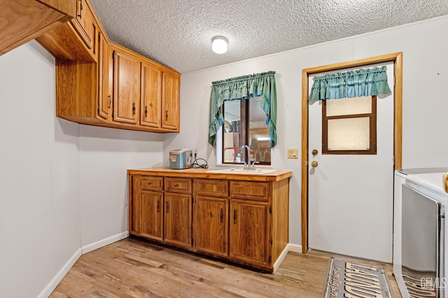 Undisclosed Address Tehachapi, CA 93561 - Photo 21 of 32 a bathroom with a sink and a mirror