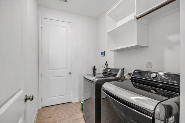 a view of appliances and cabinets