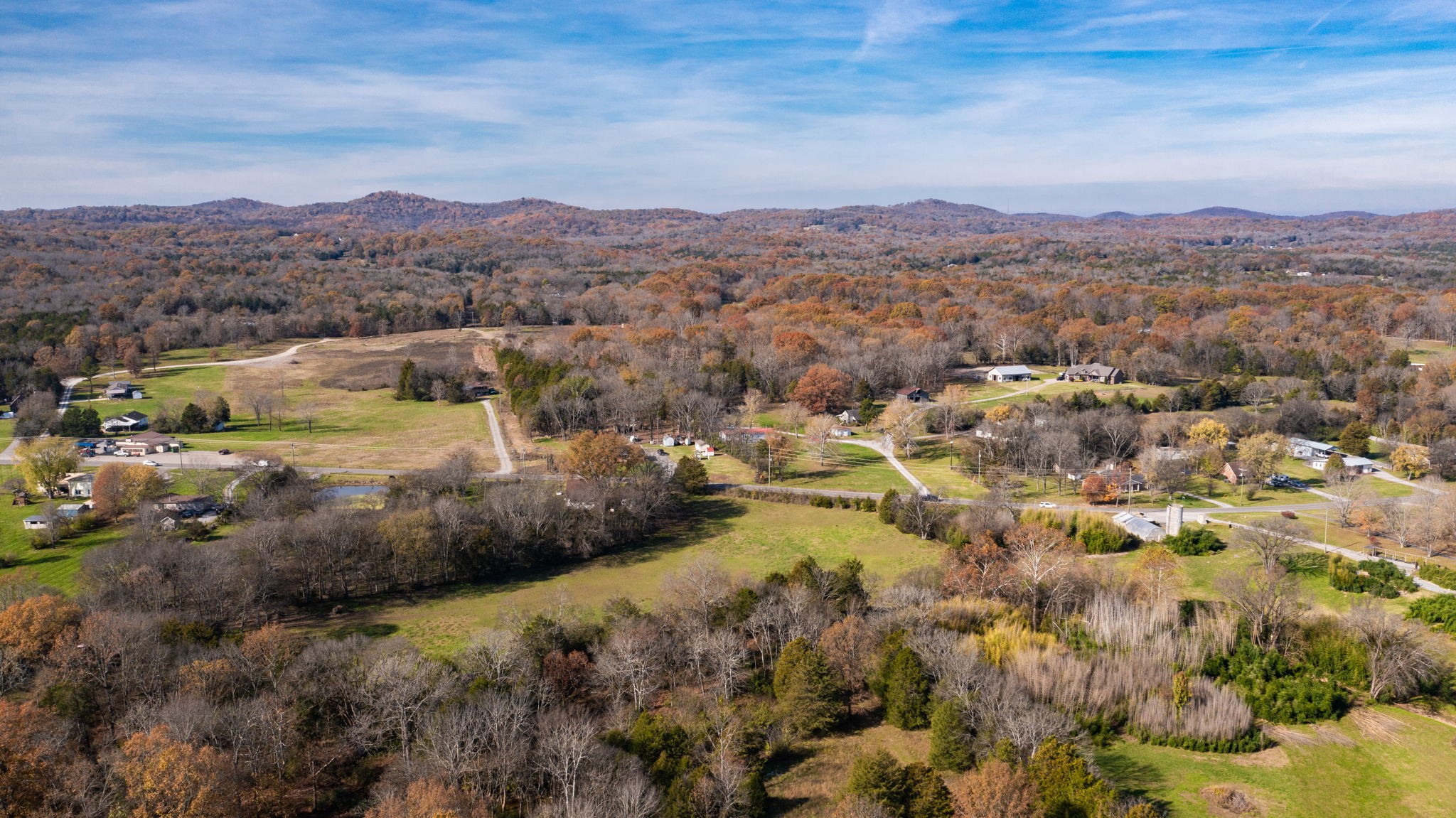 7477 Almaville Road Murfreesboro, TN 37128 - Photo 17 of 29 an aerial view of residential houses with outdoor space and trees