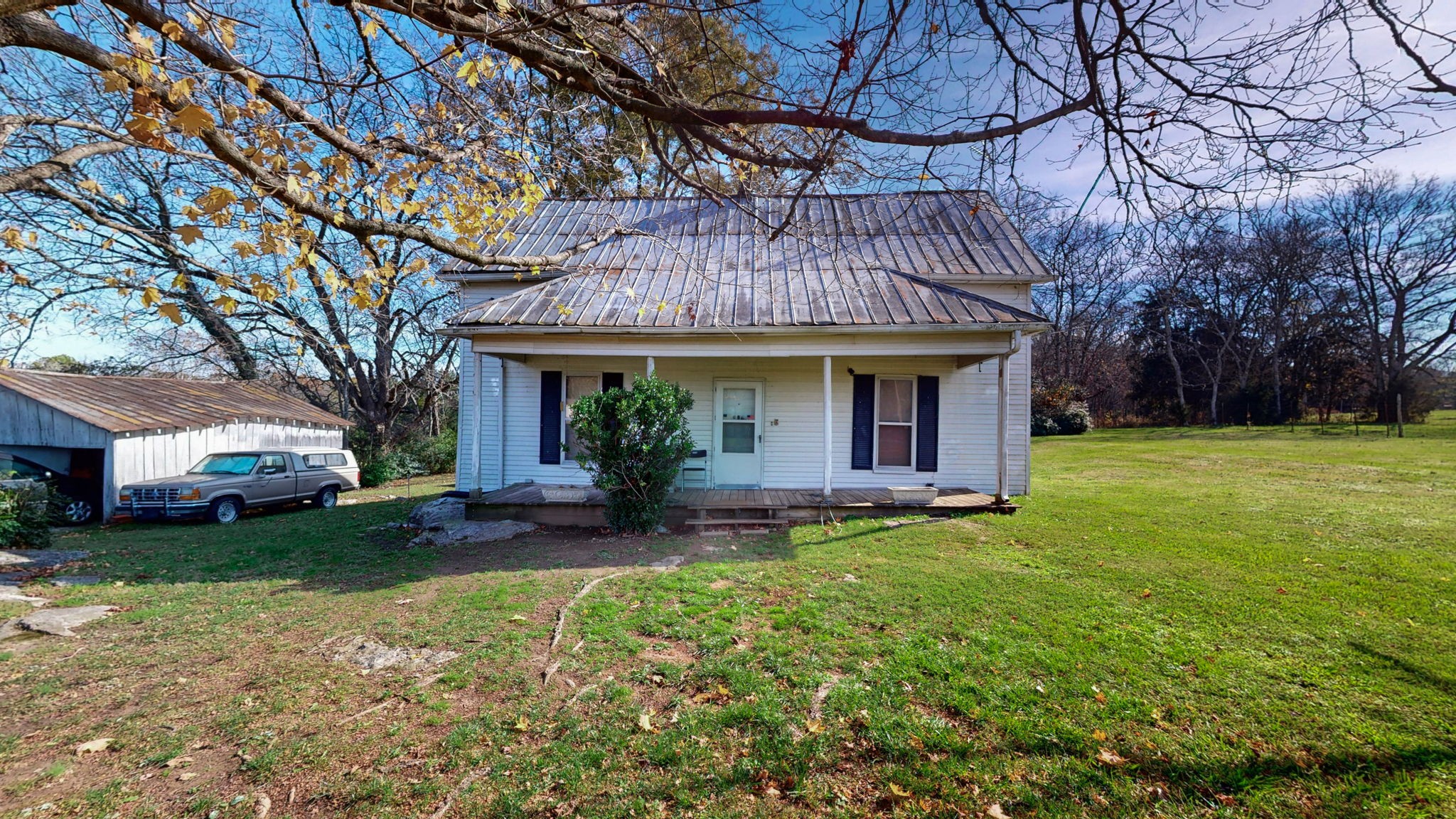7477 Almaville Road Murfreesboro, TN 37128 - Photo 4 of 29 a view of a house with garden and porch