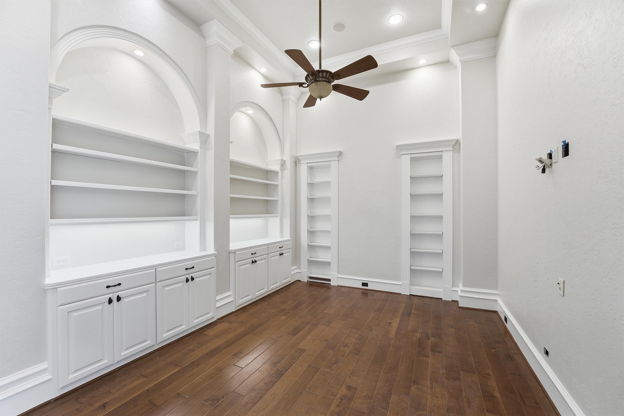 70 Quail Rock Place The Woodlands, TX 77381 - Photo 11 of 46 wooden floor in an empty room with a window