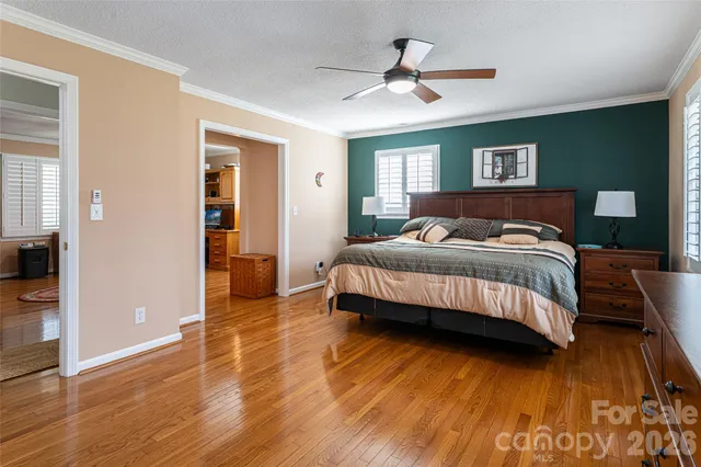 a bedroom with a bed and a view of bedroom