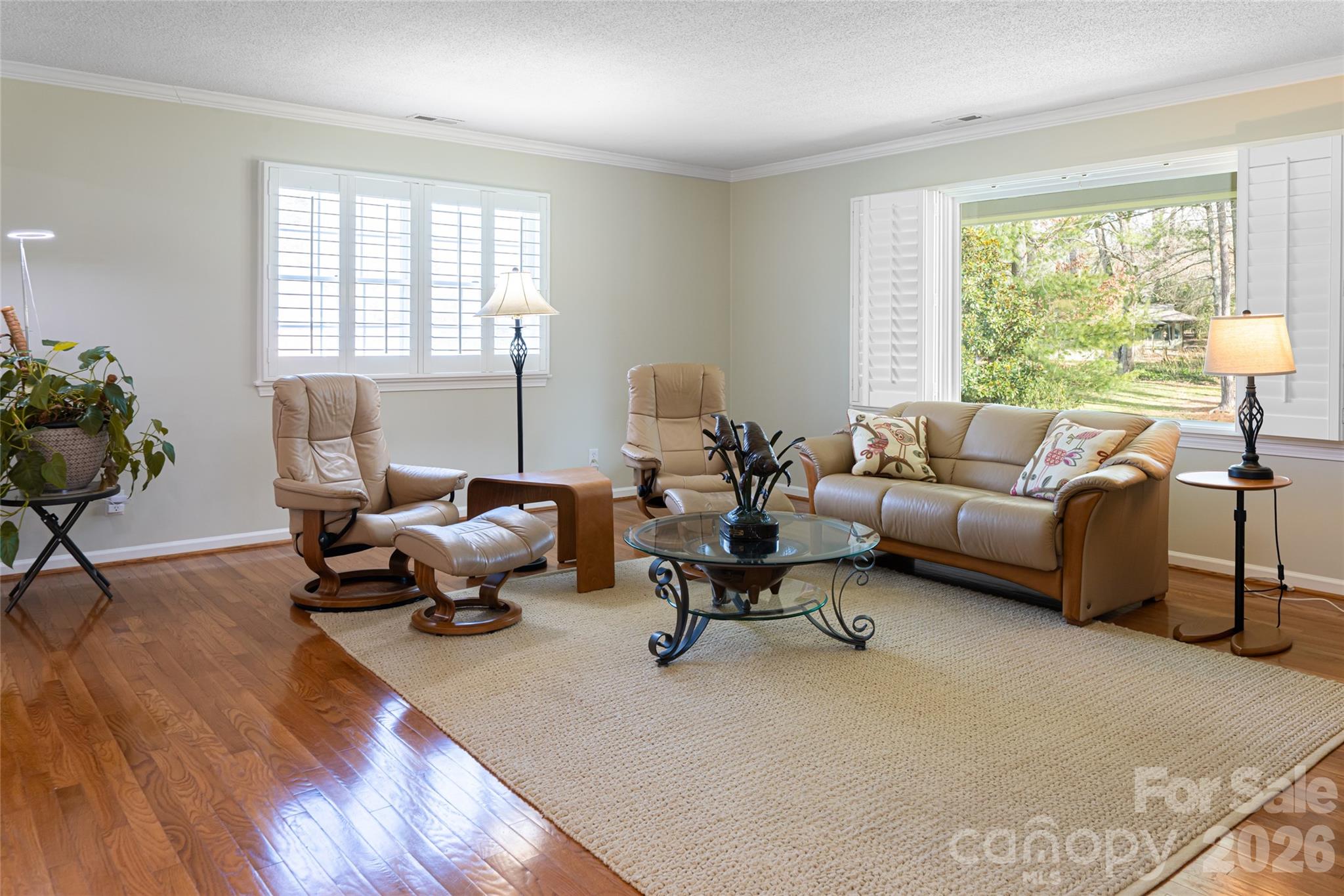 774 Crooked Creek Road Hendersonville, NC 28739 - Photo 10 of 46 a living room with furniture and a window